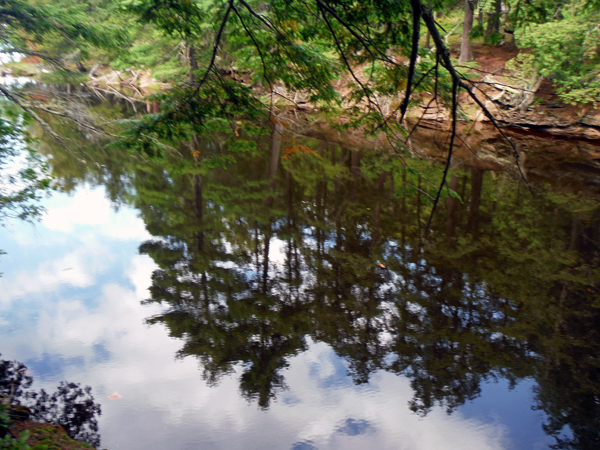 reflections in Presque Isle River
